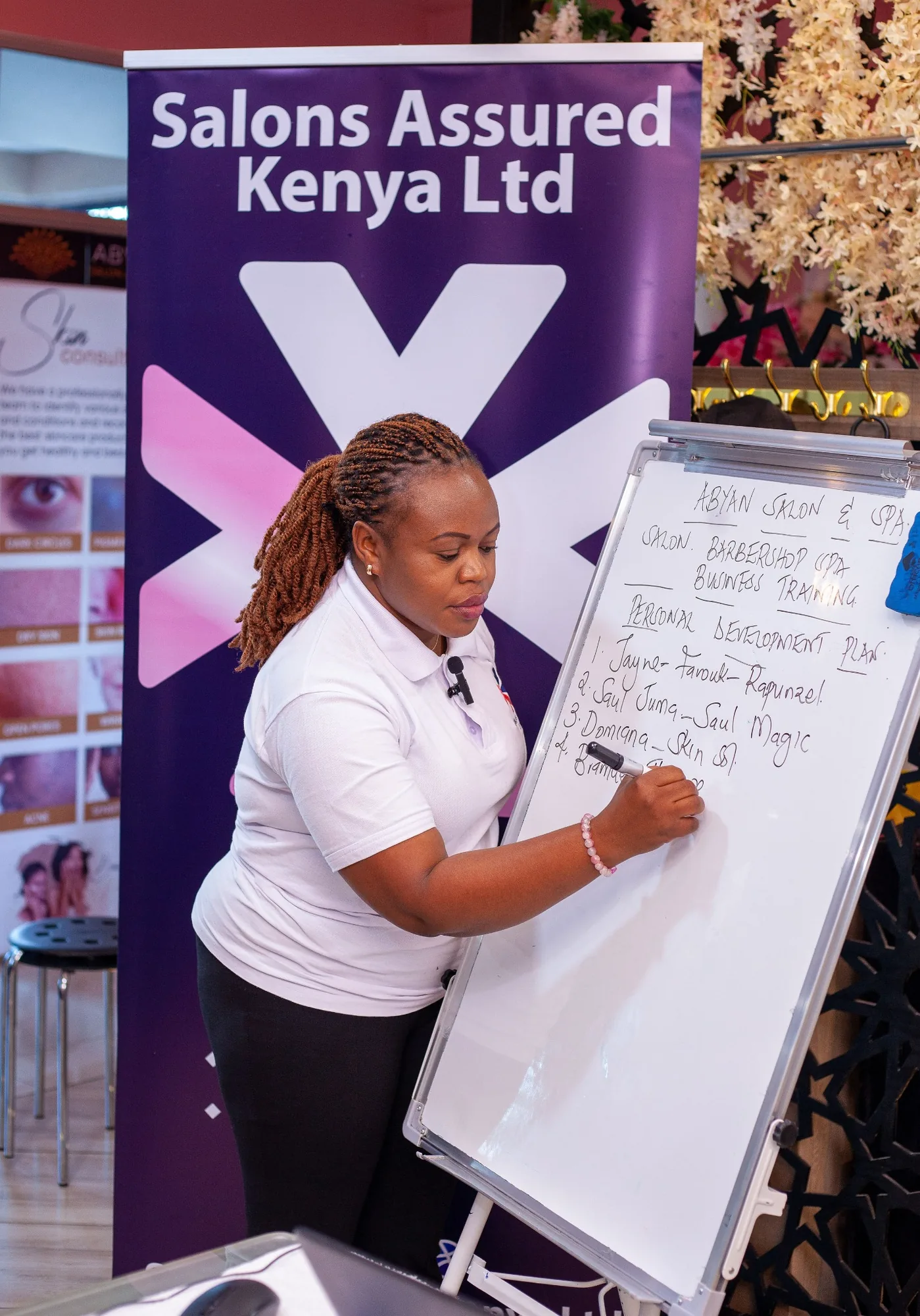 Salons Assured Kenya consultant developing a business training plan