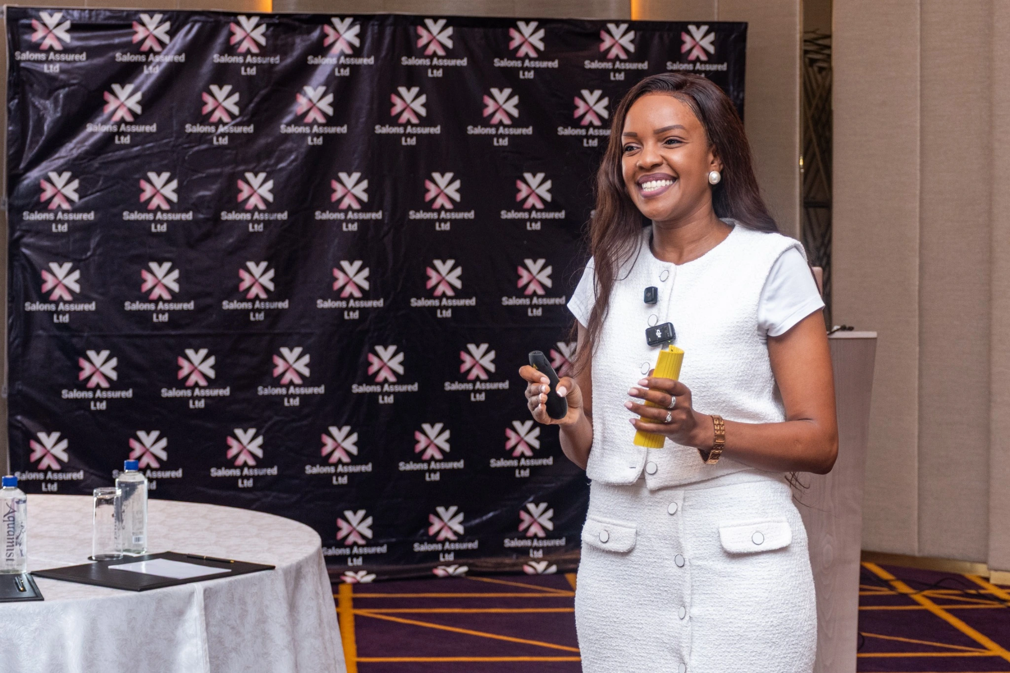 Salons Assured facilitator engaging participants during a professional event