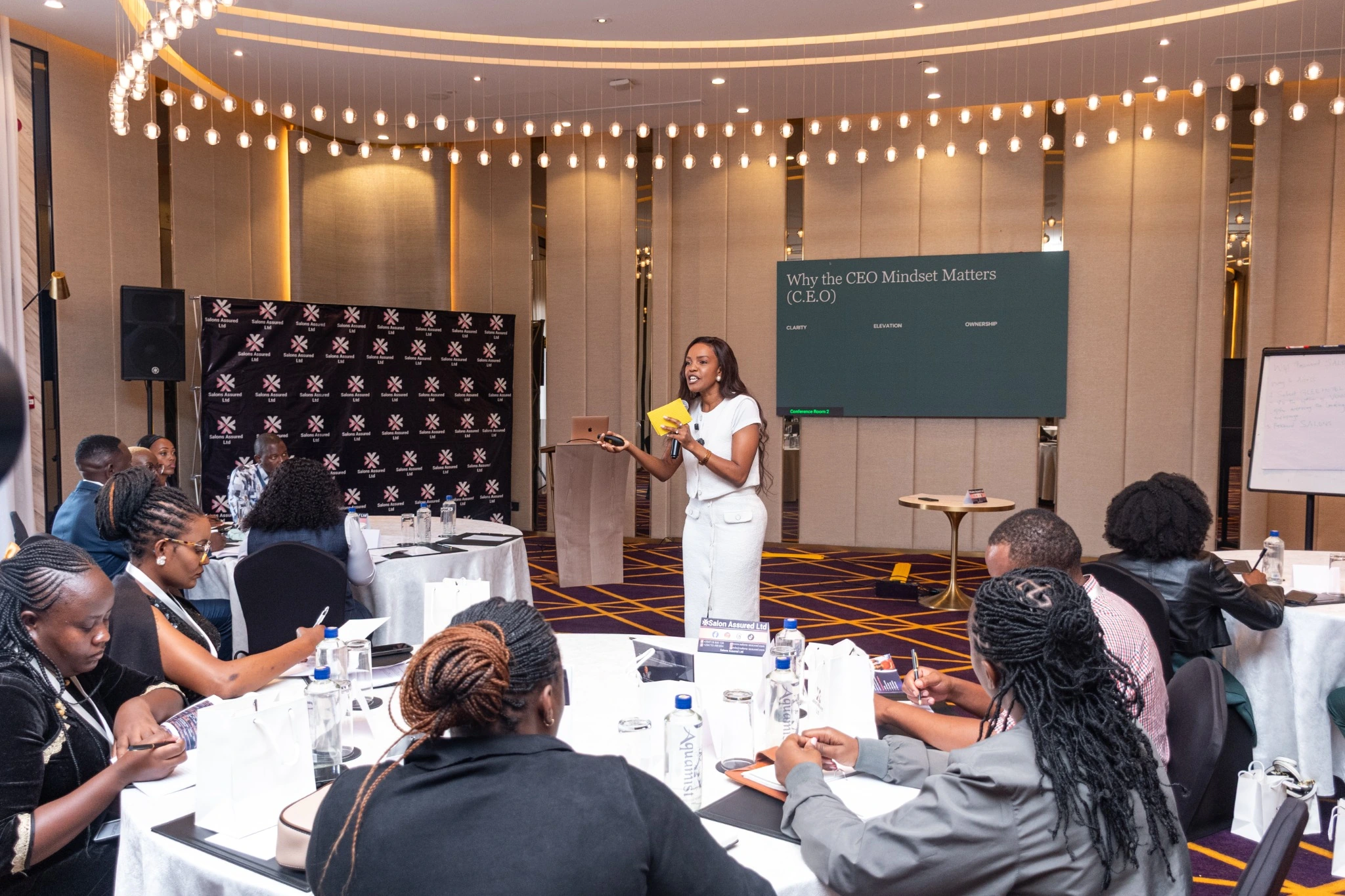 Salons Assured beauty business learning session with facilitator and participants