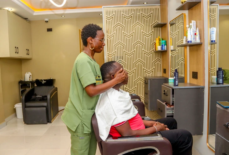 Beauty therapist providing a professional service to a client