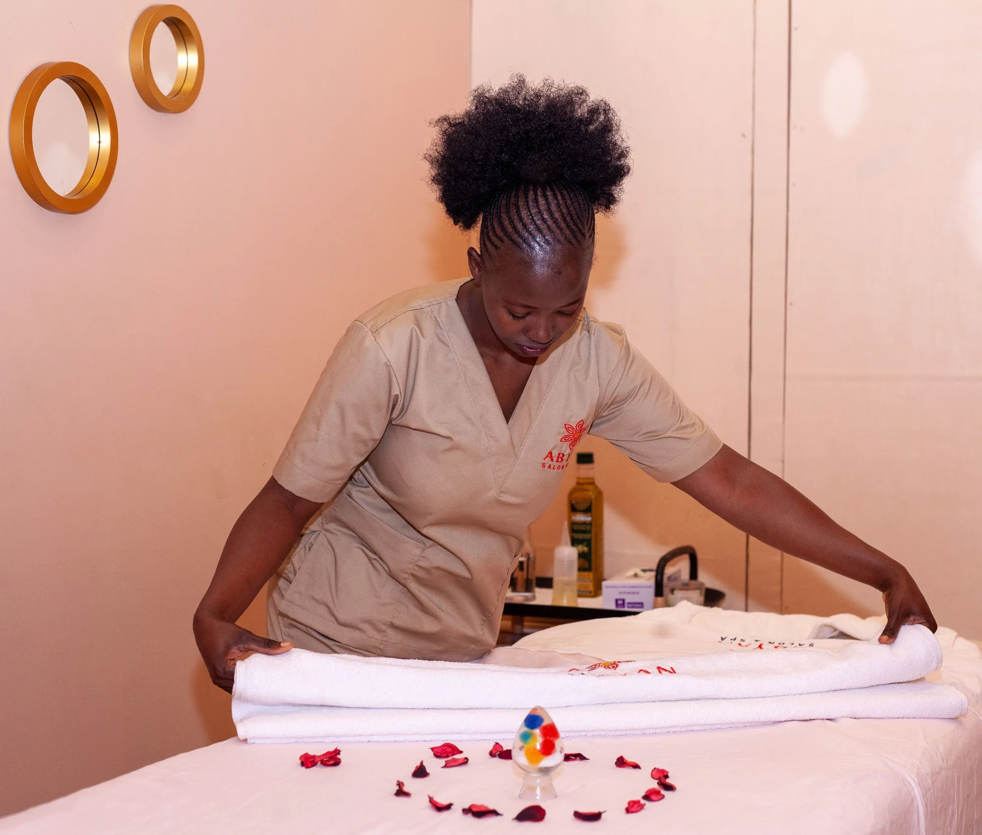 Beauty professional preparing a treatment room for business operations
